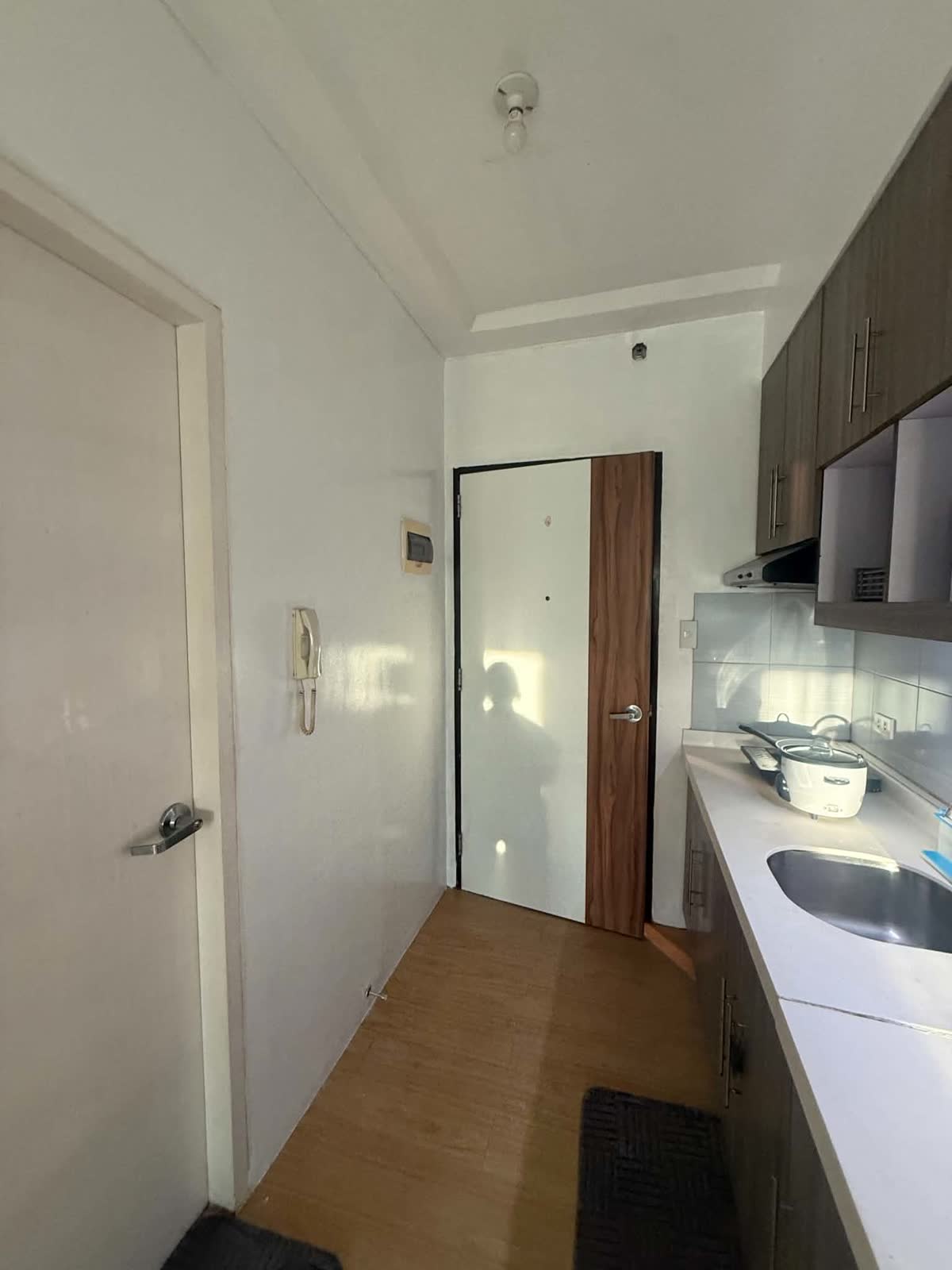 Entry and kitchenette, as found