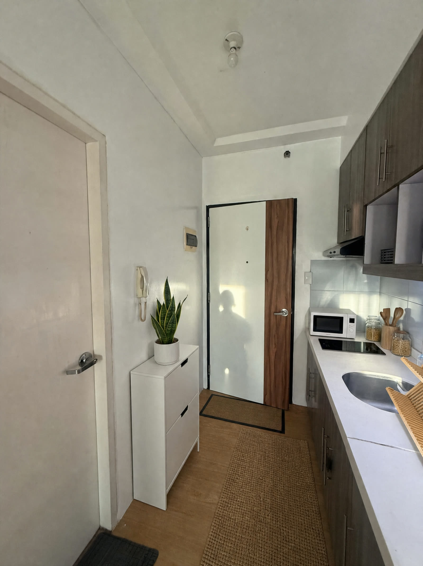 Entry and kitchen · styling only, after